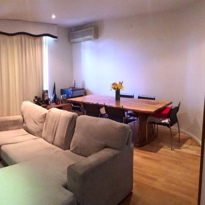 Large dining table with bar rack and bar fridge