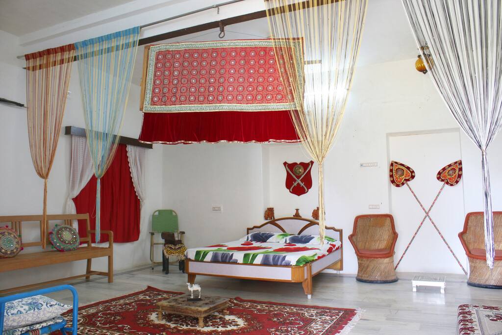 The room has 1 double bed and 3 single beds perfect for a family or group of friends.