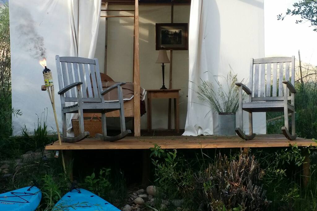 Watch the river run, the blue herons nest, and trout jump from the front deck