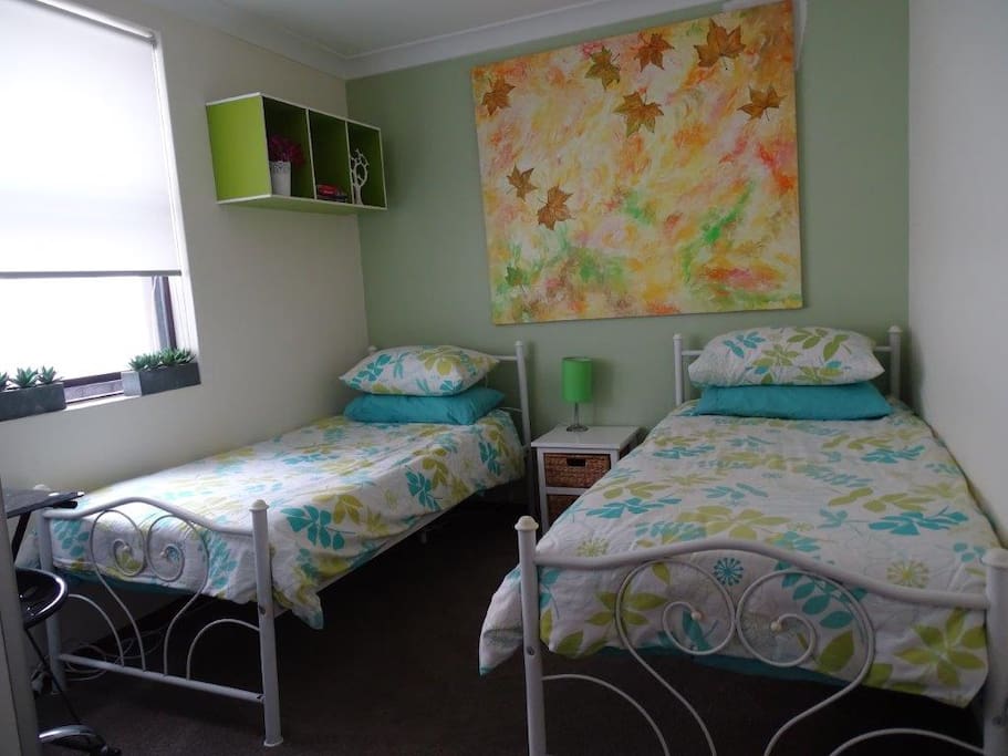 The Autumn room is the second bedroom with 2 x single beds &TV