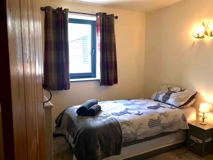 Two single beds in this bedroom, one is a trundle which is permanently set up -it is slightly shorter than the other but often used by adults 