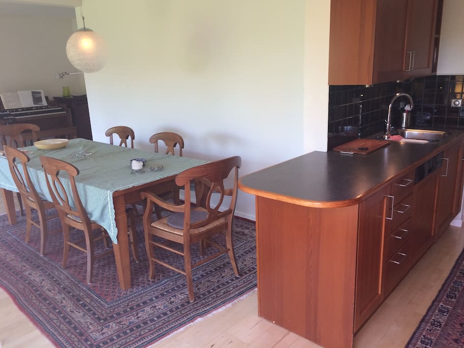 Dining area, seats 6, 4 more chairs available.