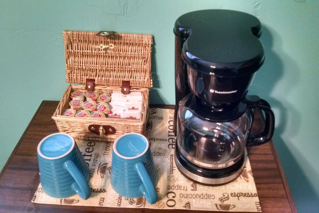enjoy a cup of coffee with your fully stocked in-room coffee station
