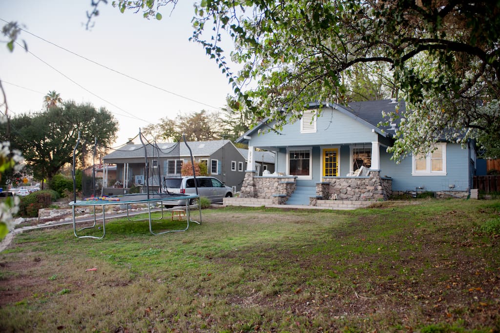 Front yard with trampoline.