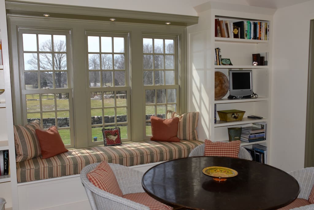 Dining area in kitchen overlooking farm