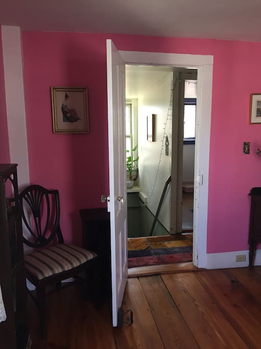 Pink Room is just up the upstairs and across from the bathroom.