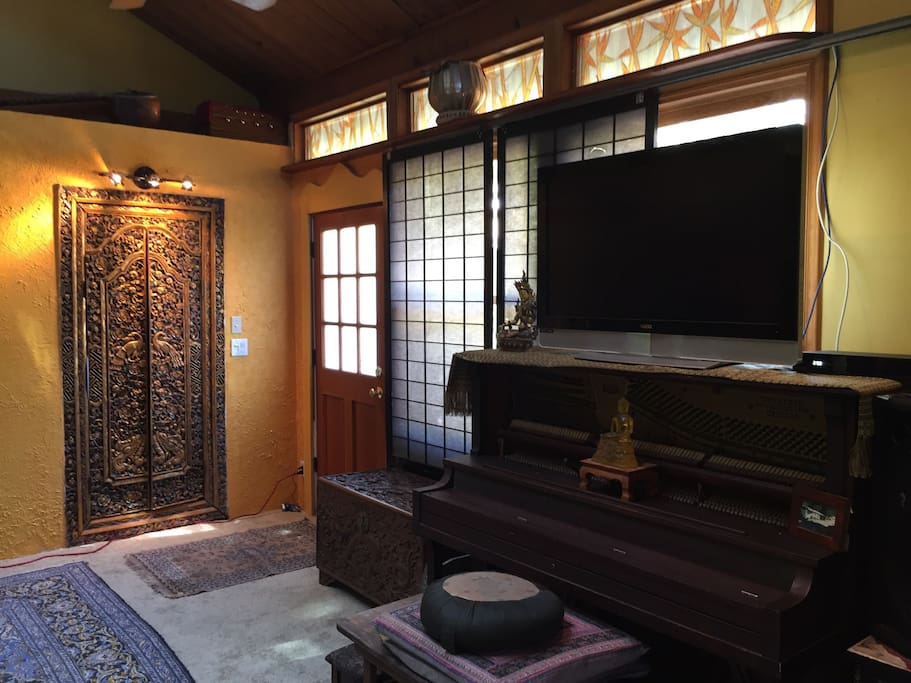 Piano tv with cable hand carved Balinese doors