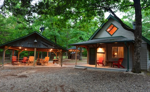 Rent both cabins, each cabin sleeps 4, total of 8.