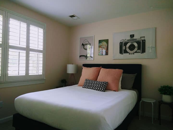 Relax in this cozy bedroom with a comfortable bed and stylish decor.