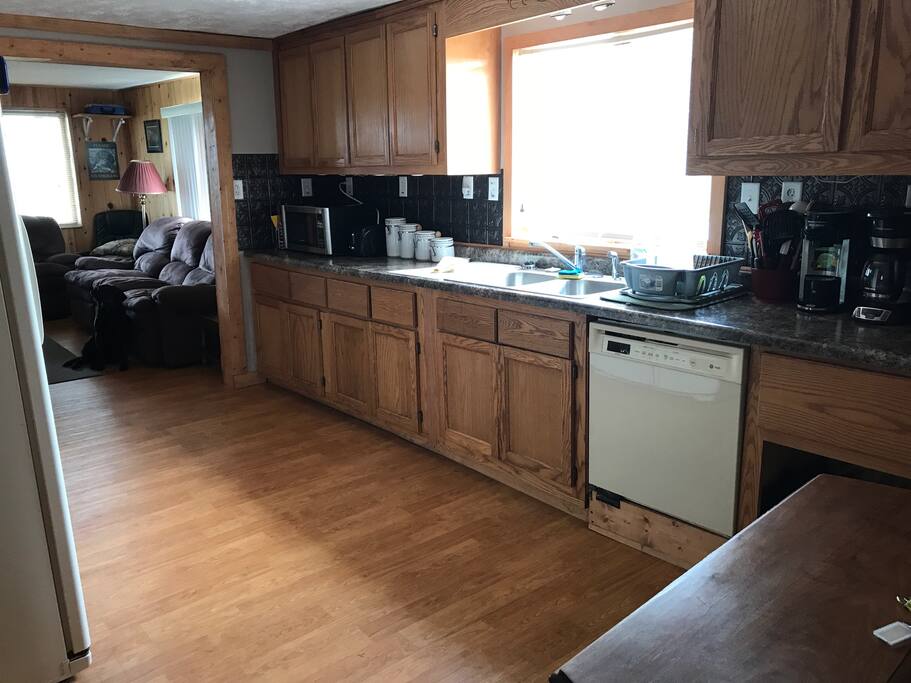 Fully stocked Kitchen with a dishwasher