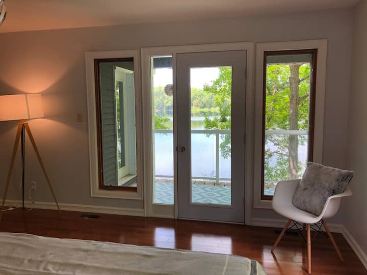 Main master bedroom with balcony over looking the lake