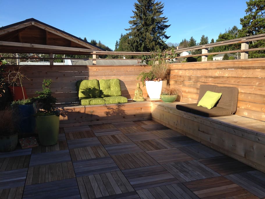 Rooftop deck seating and Yoga space