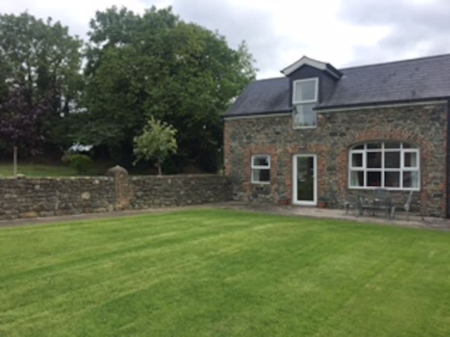 Front view of the cottage with walled garden