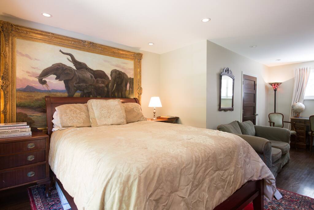 Queen size bed, couch in suite