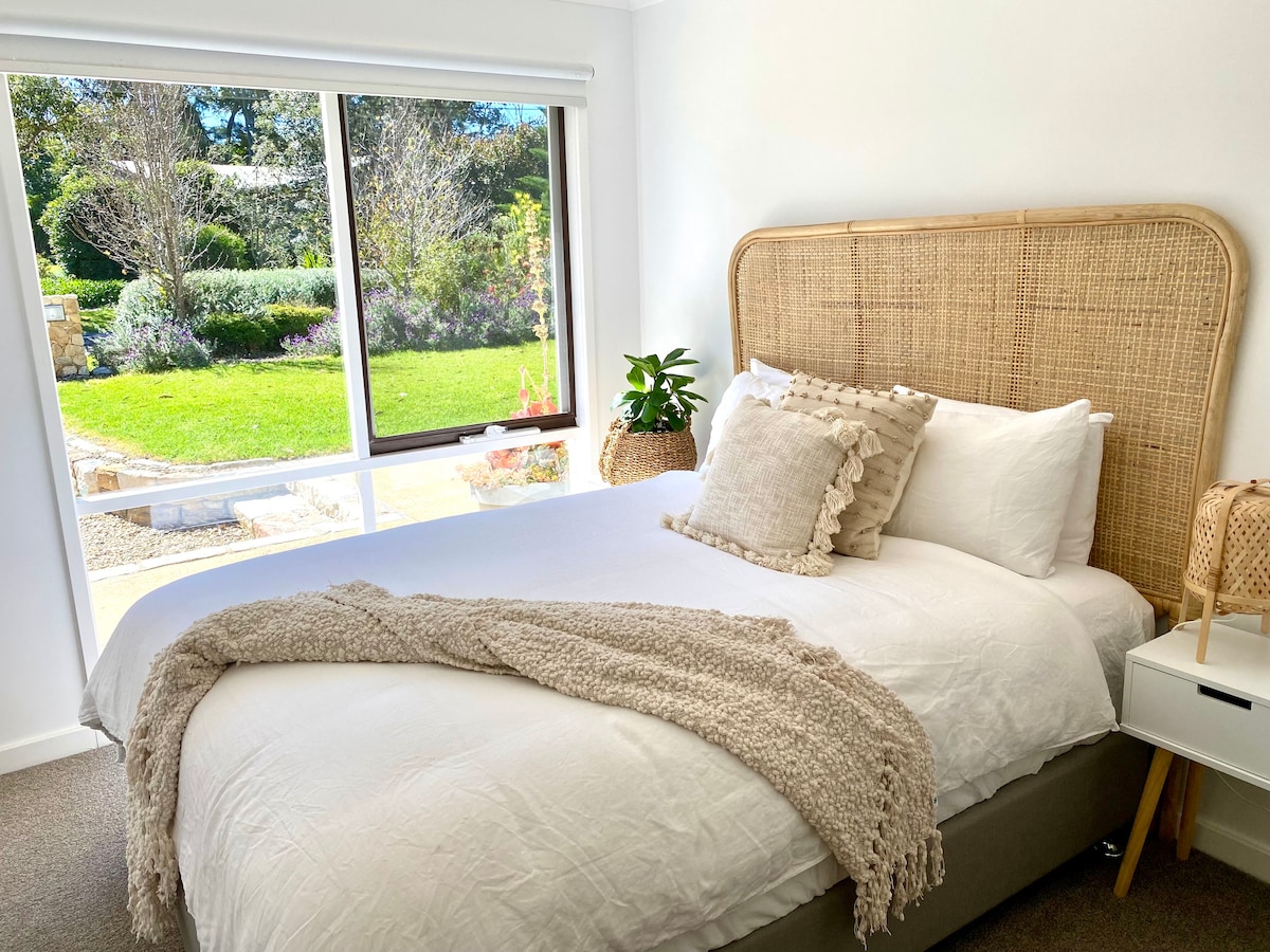 Bedroom 3 with brand new queen sized bed. 
Room has a ceiling fan and storage space. 