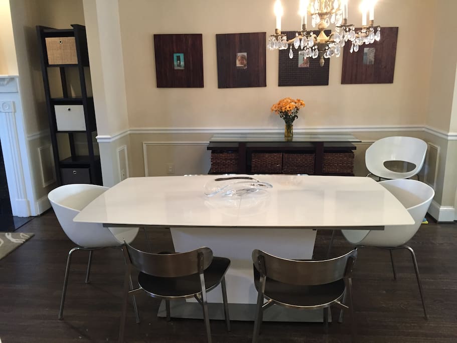 The dining room table can expand to fit 10+ comfortably.