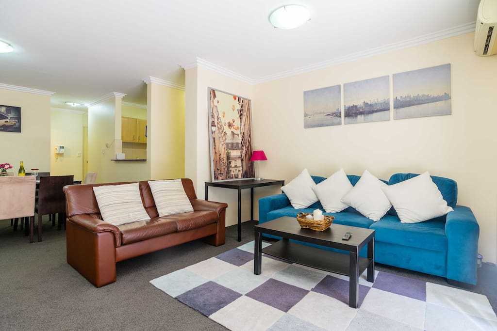 (Living Area photo#1) The spacious living area includes two full sized lounges, widescreen TV, full size dining table and kitchen.