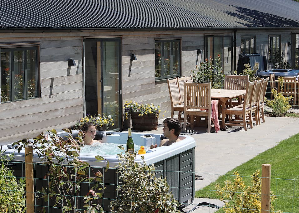 Early Mist - enclosed individual garden with patio furniture, hot tub, BBQ and gate to shared lawn
