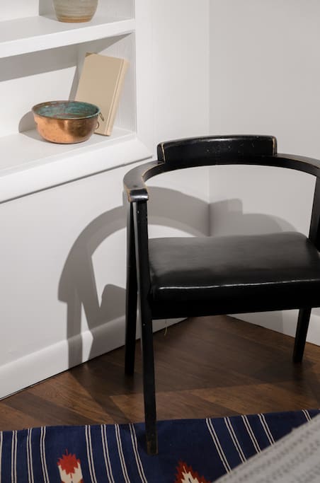 The space features built-ins and spots to sit, read, and enjoy.
