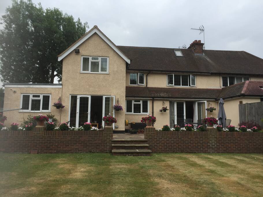 This is the back of the house. A very sunny and pleasant terrace to sit in during summer time.