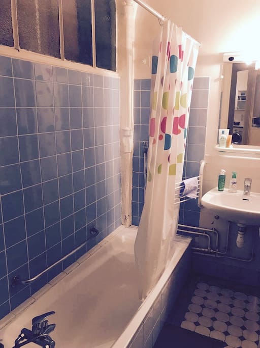 Shared bathroom with hot tub