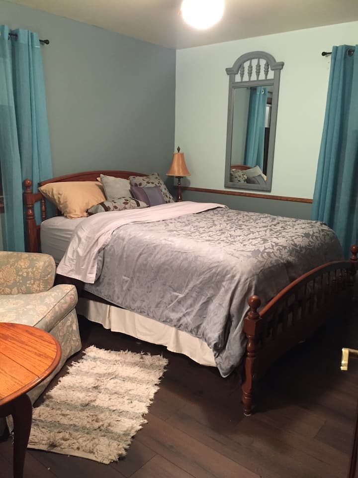 Bedroom with full closet and dresser