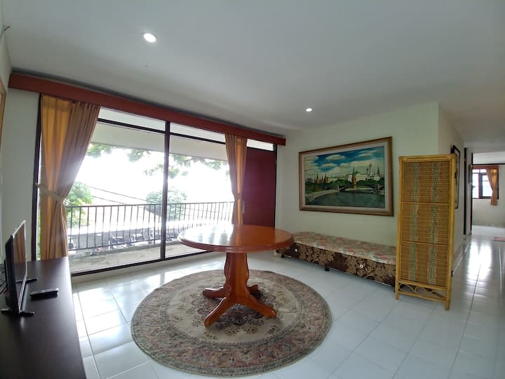 Upper living room with TV and day bed