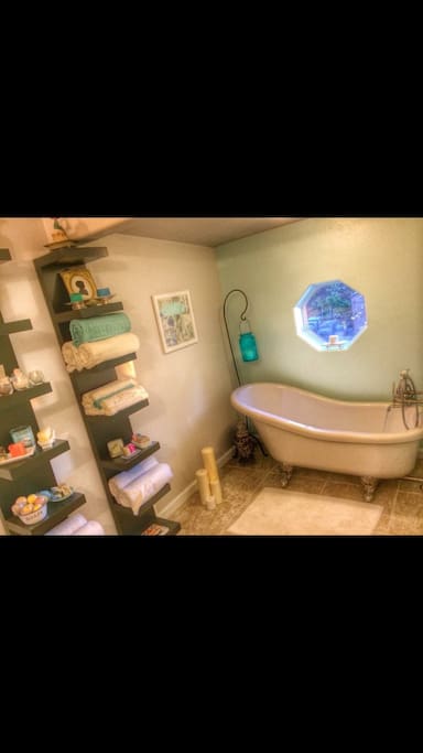 The restroom is on the main level. Our house has ONE restroom. Our house has a Claw Foot Tub with the shower wand but NO traditional SHOWER.