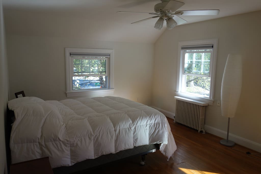 The master bedroom with blackout shades. Queen size mattress and down comforter.