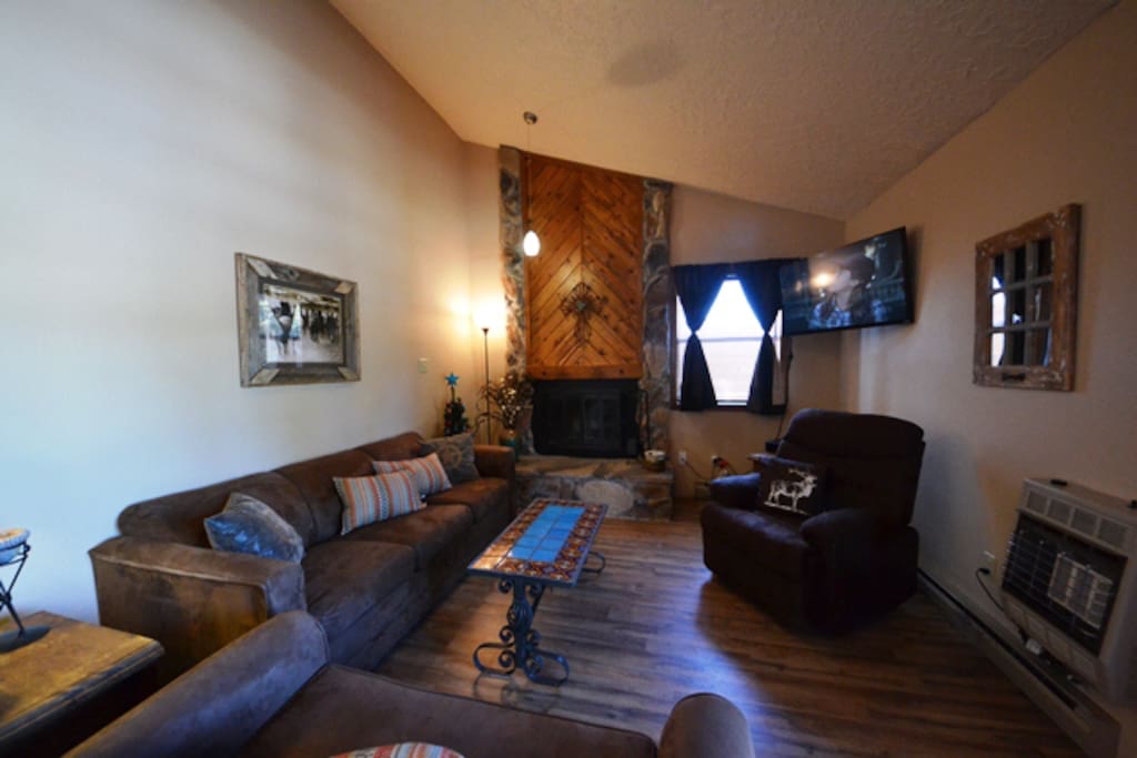 The living room has a couch, love seat and recliner.