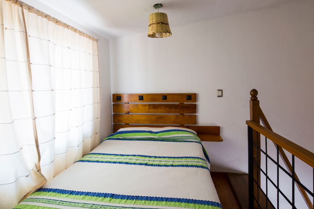 Habitación Tapanco con cama matrimonial