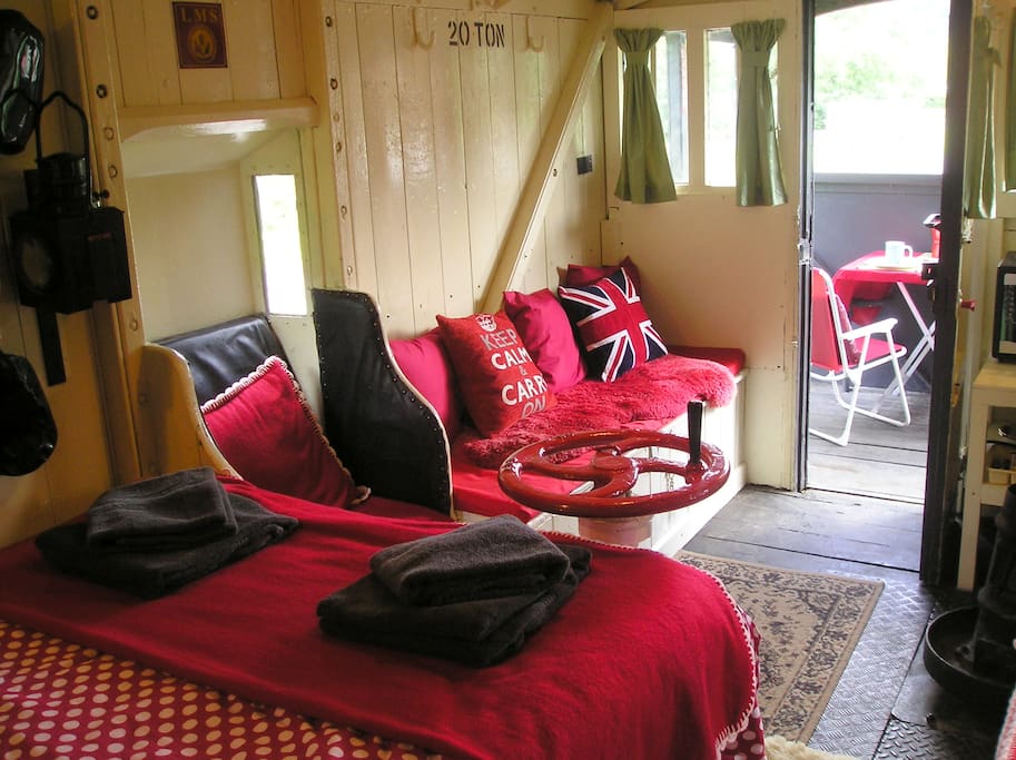 There is additional storage under the sofa and there is outside space on balconies at both ends of the carriage.