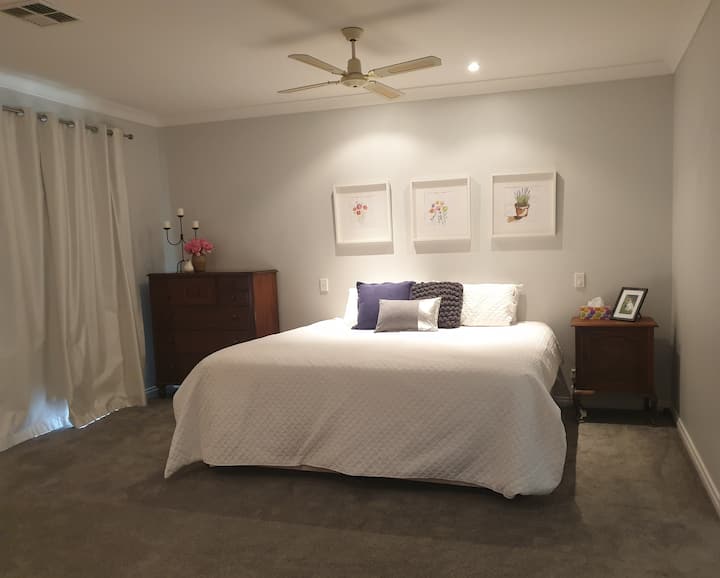 The master bedroom is very spacious  with a super king size bed