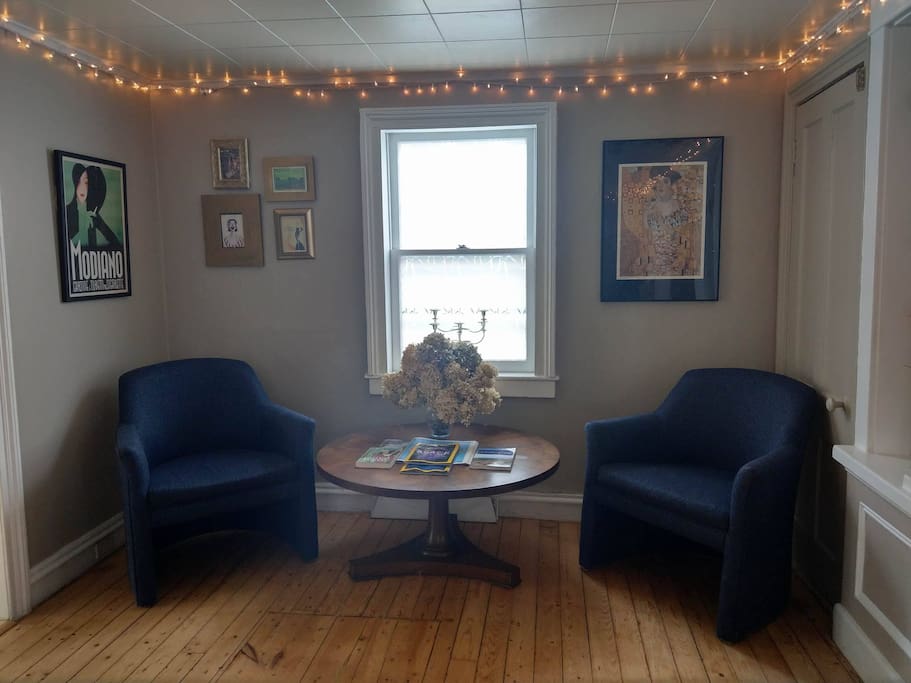 If you're sitting on the couch watching Netflix, this sitting area is to your left.