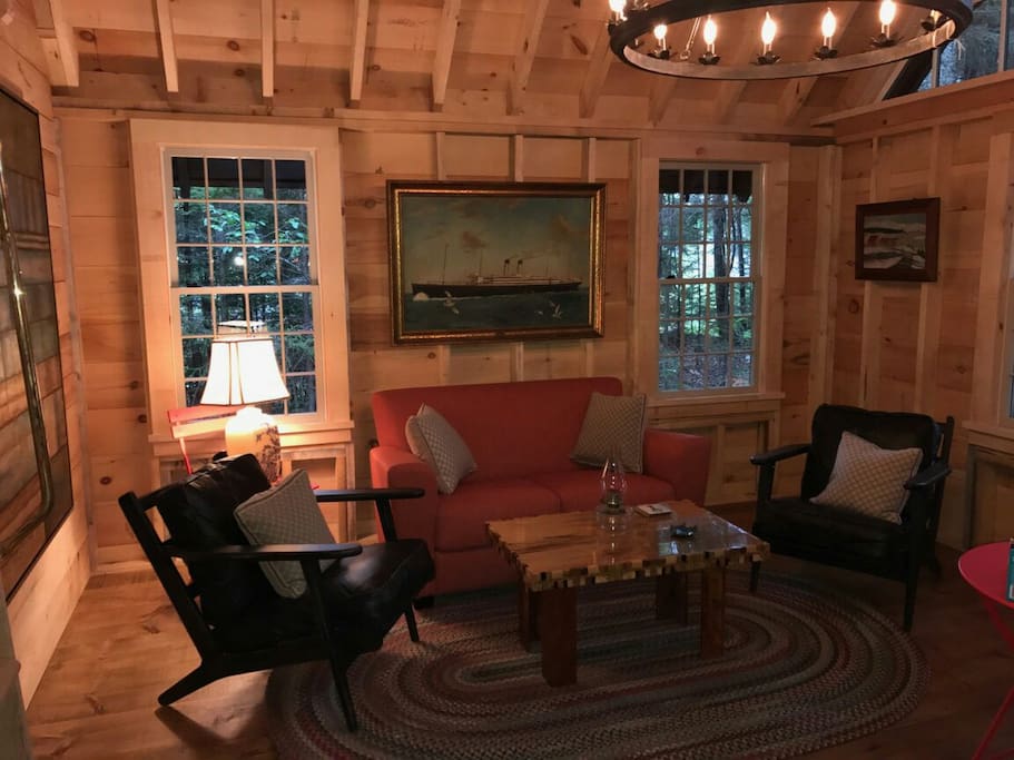 Always at work adding new pieces to the space. Most recent picture with new couch, painting, and lamps added!
