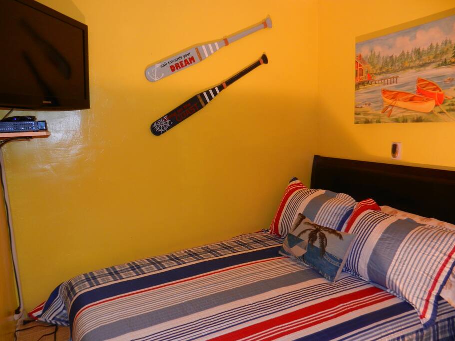 Another view of the room with flat screen TV with cable, WiFi.