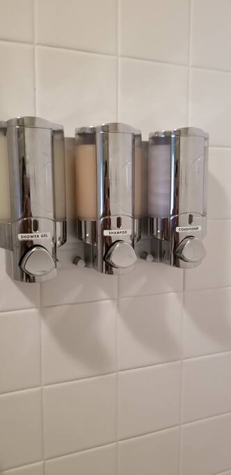 Shampoo, Conditioner and Shower gel caddy in shower