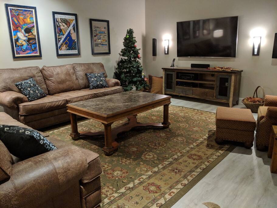 Newly renovated media room in lower walkout basement.