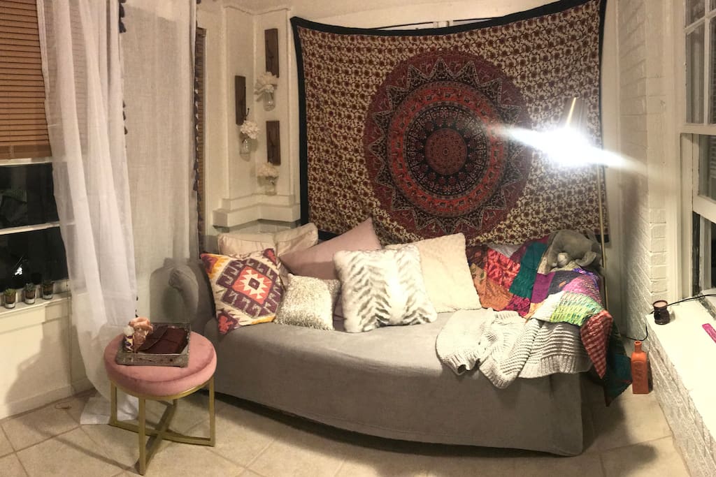 this is the guest room with a really comfy pull-out sofa! there is also a private air conditioning window unit in this room.