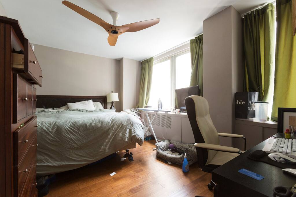 The queen bedroom with someone staying there