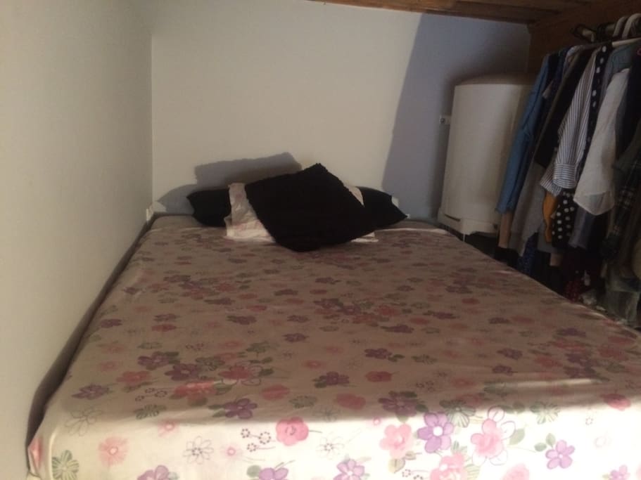 Super comfortable double bed in mezzanine.