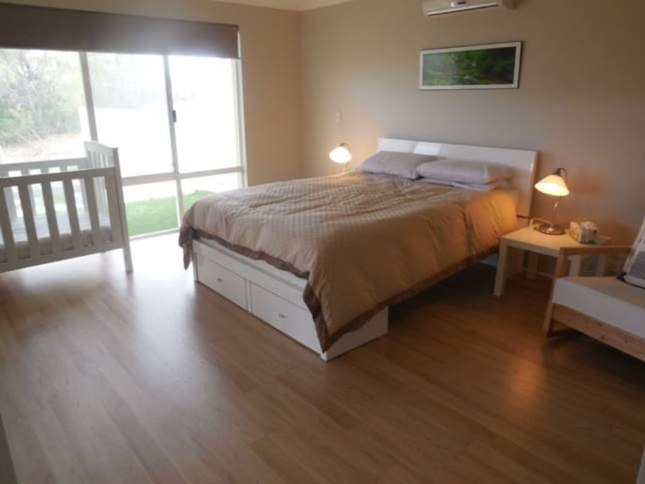 Main bedroom with cot