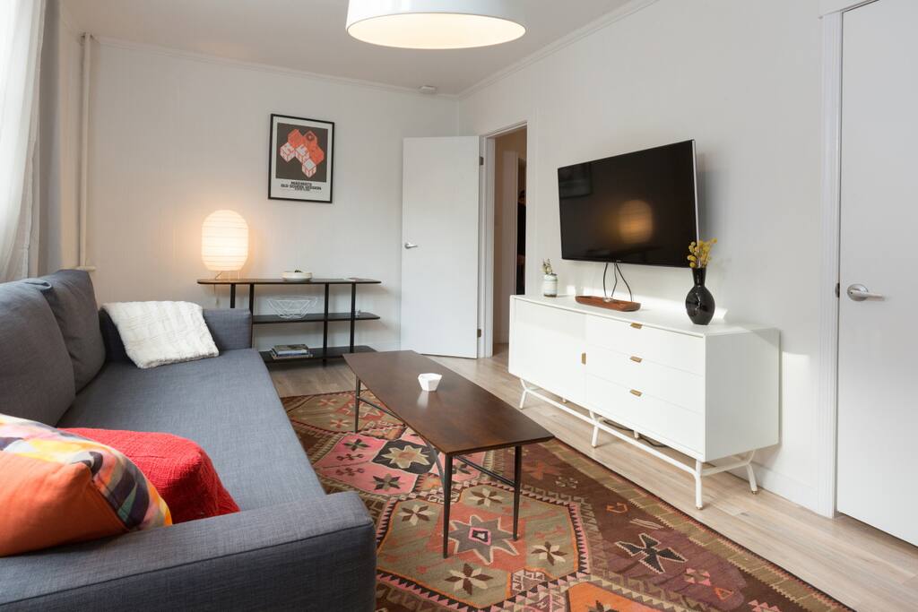 Living room opens to the vestibule and second bedroom