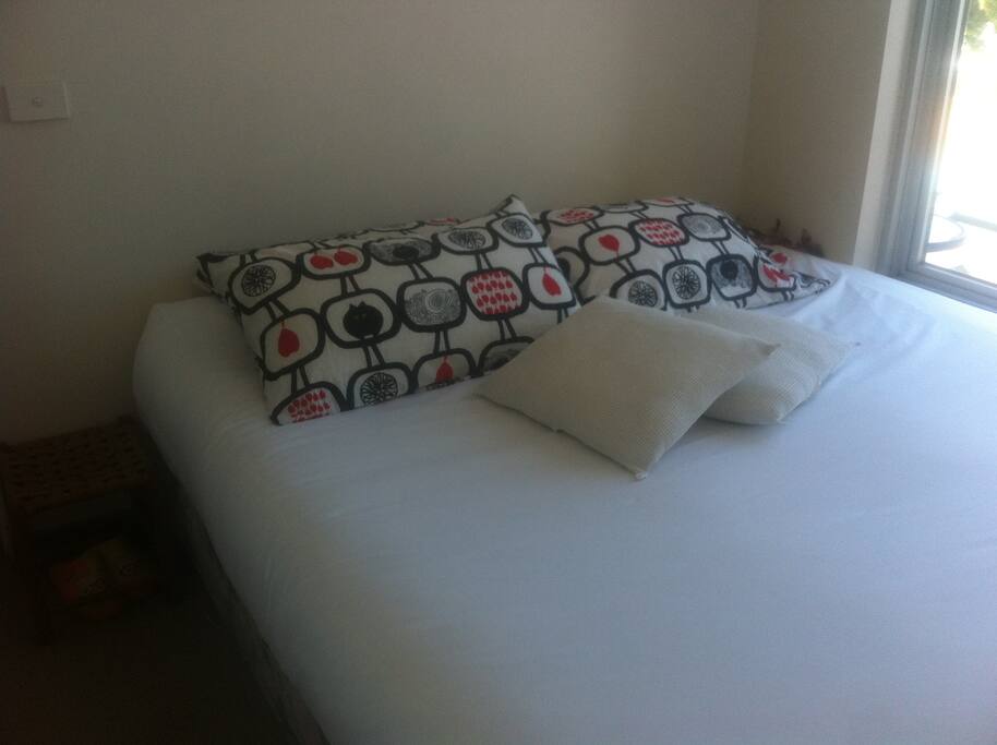 Separate bedroom overlooking the balcony