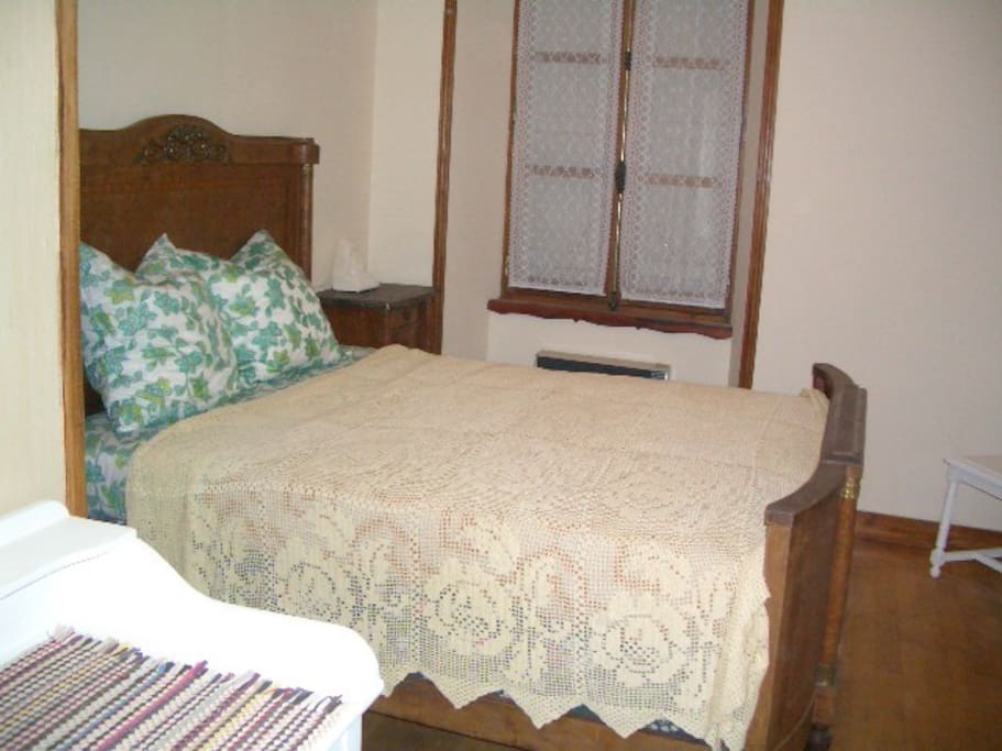 Spacious double room with dressing room area.