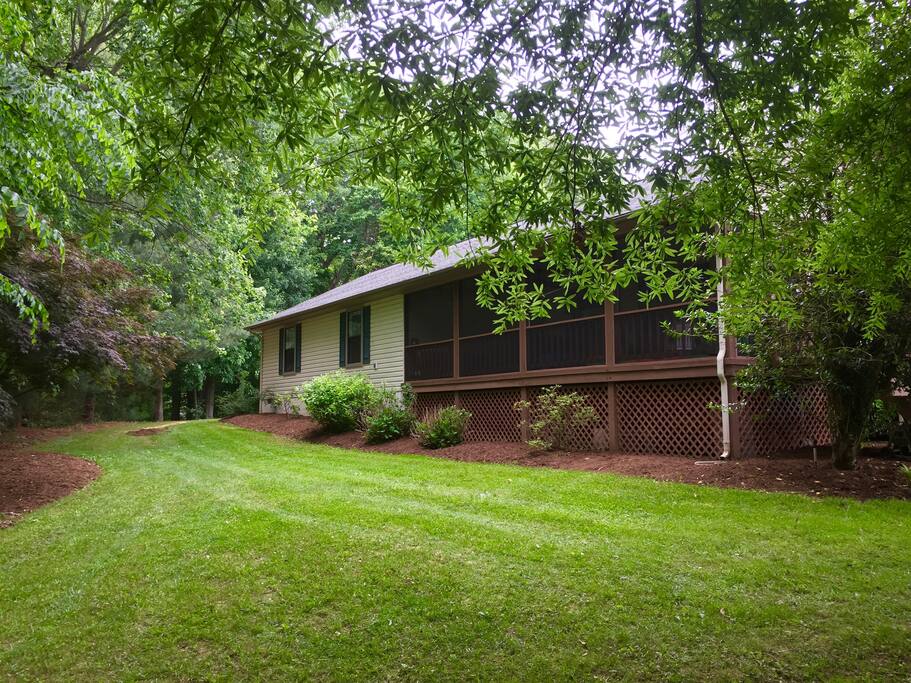 House is surrounded by lovely gardens and offers a serene outdoor space for BBQ's or a perfect place for children to play.