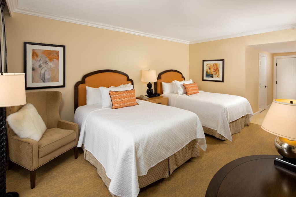 Sink into one of the comfortable queen beds.