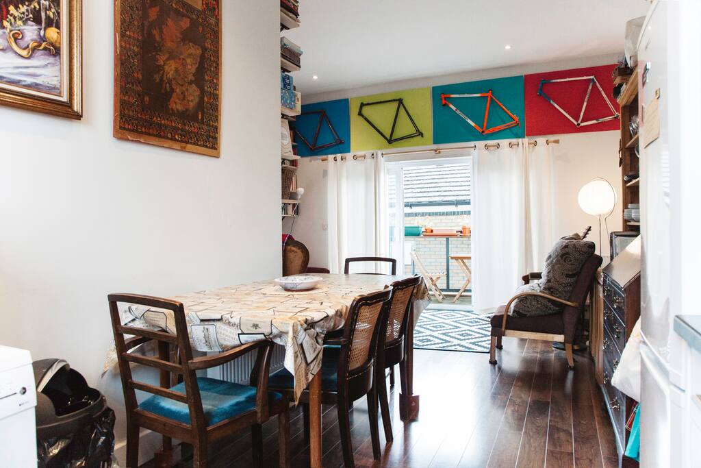 View of dining area and living room from kitchen