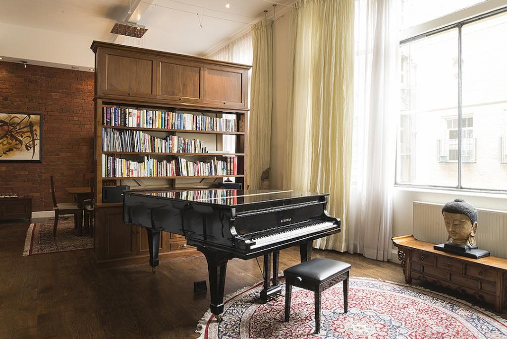 You'll love the entertainment zone with a grand piano