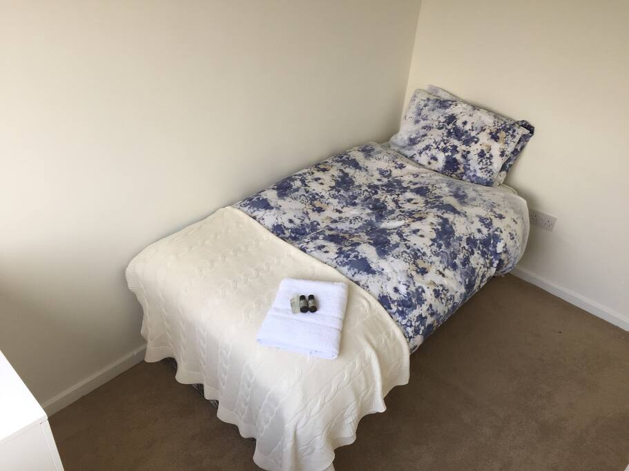 Clean newly decorated room with new bed and mattress